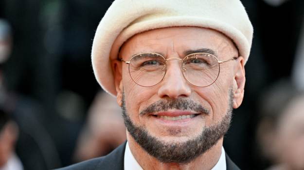 John Travolta ze Złotą Palmą w Cannes. Na..